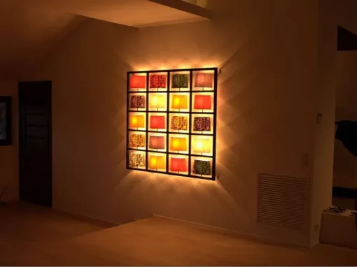 Installation d’éclairage décoratif à Toulouse – A.M Elec Éclairage mural design installé dans un intérieur moderne par A.M Elec